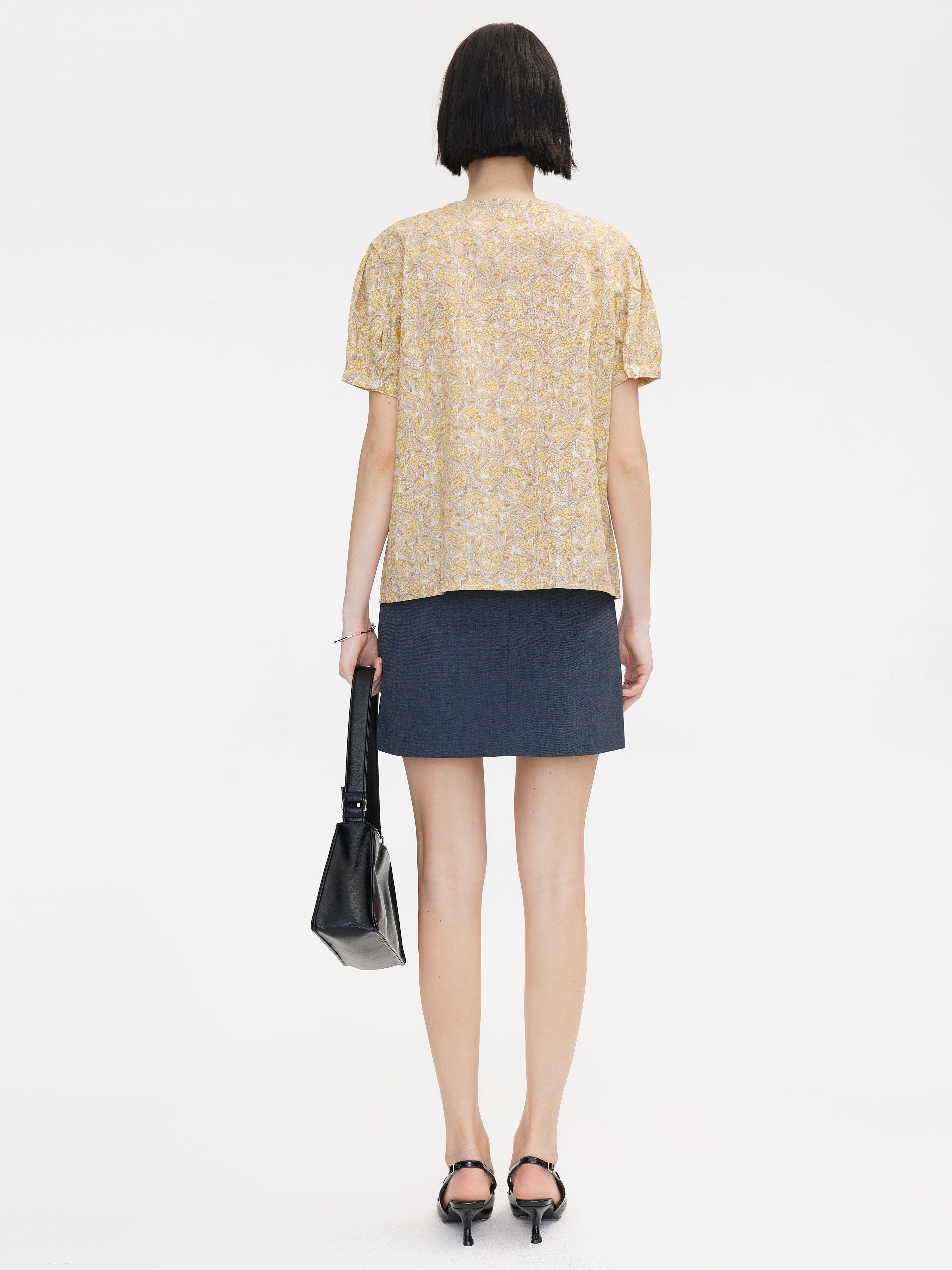 CUT OUT TAILORED MINI SKIRT FROM BACK