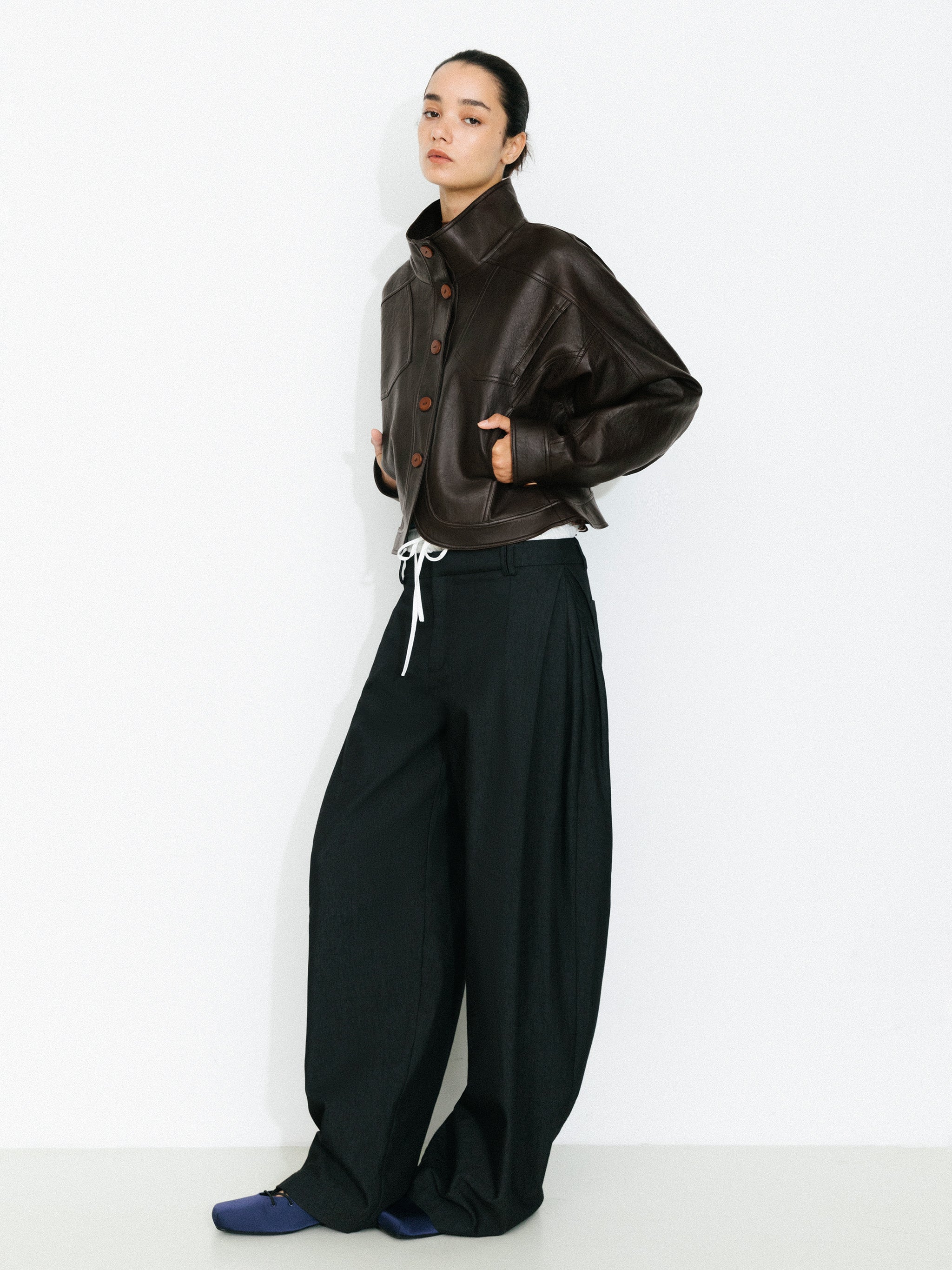 Curved Sleeve Faux Leather Jacket